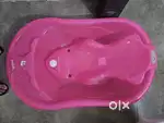Kids pink bathtub and toilet training seat unused