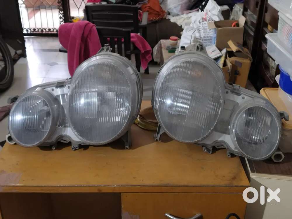 Mercedes W210 Hella German Headlights pair for sale.