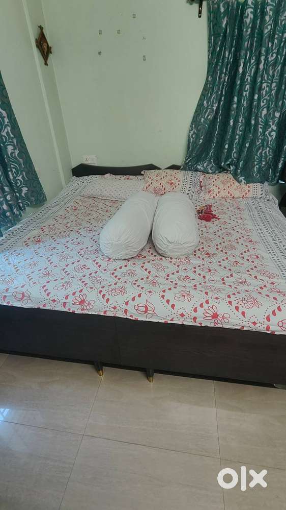 King size wooden bed