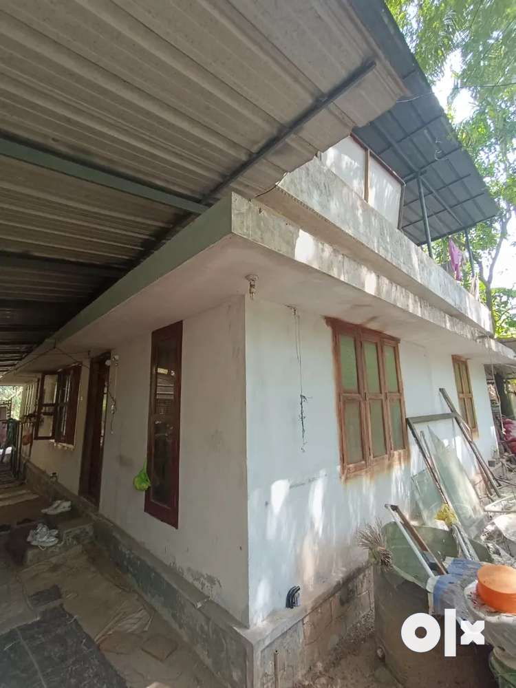 Urgent sale 50 cent land and house near kairali junction