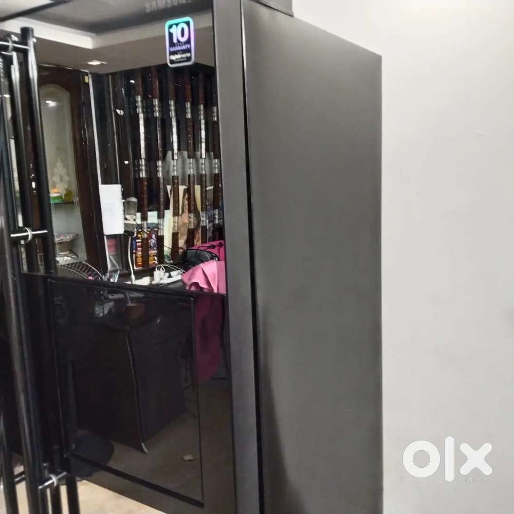 For sale 600 L samsung side by side fridge with water and ice dispense