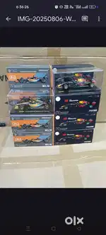 Bburago 1:43 Imported Die Cast F1 Racing Car With Acrylic Box.