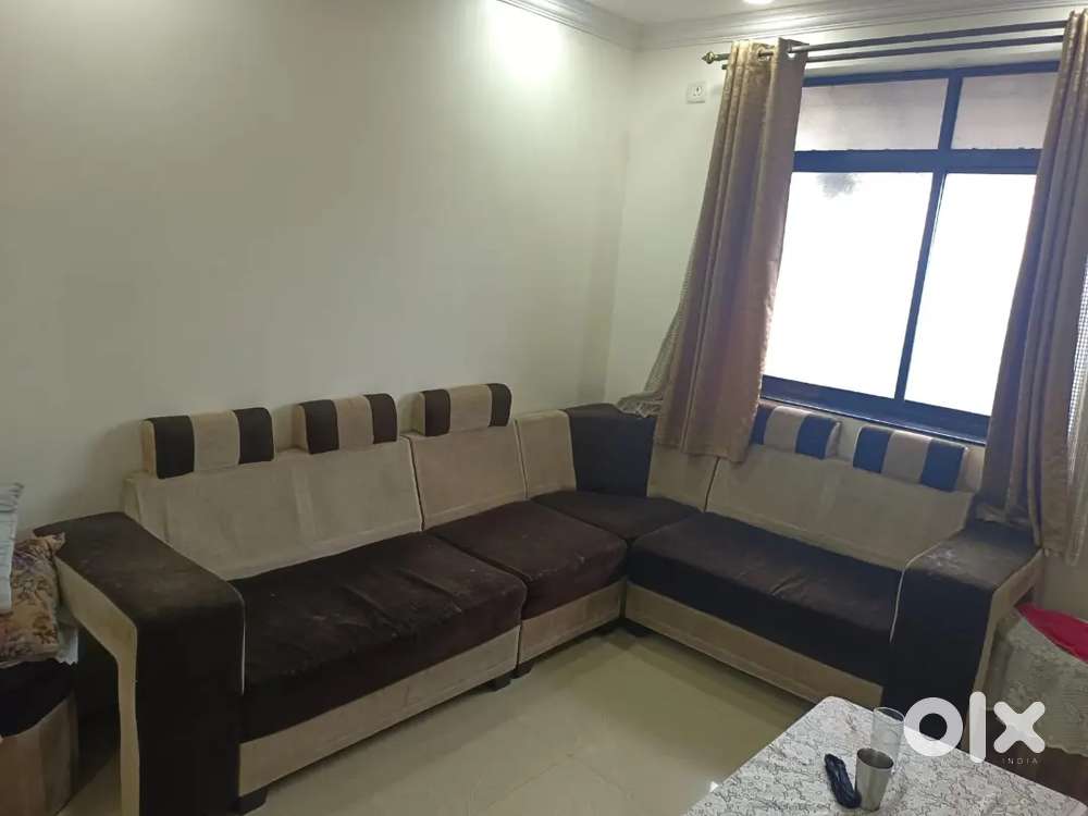 L shape. Five sitter sofa set