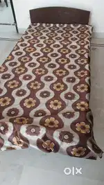 Wooden 2single beds and  center table
