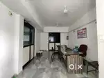 Corner double shutte office with partition