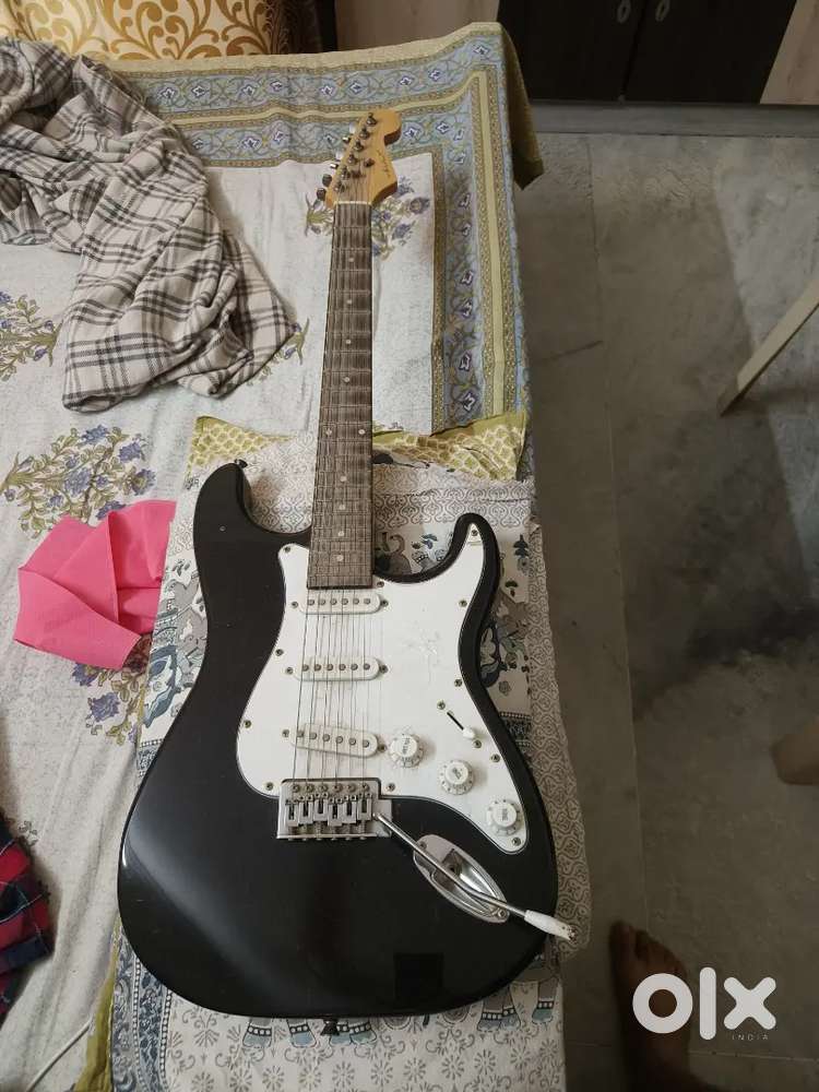 Electric guitar with amplifier