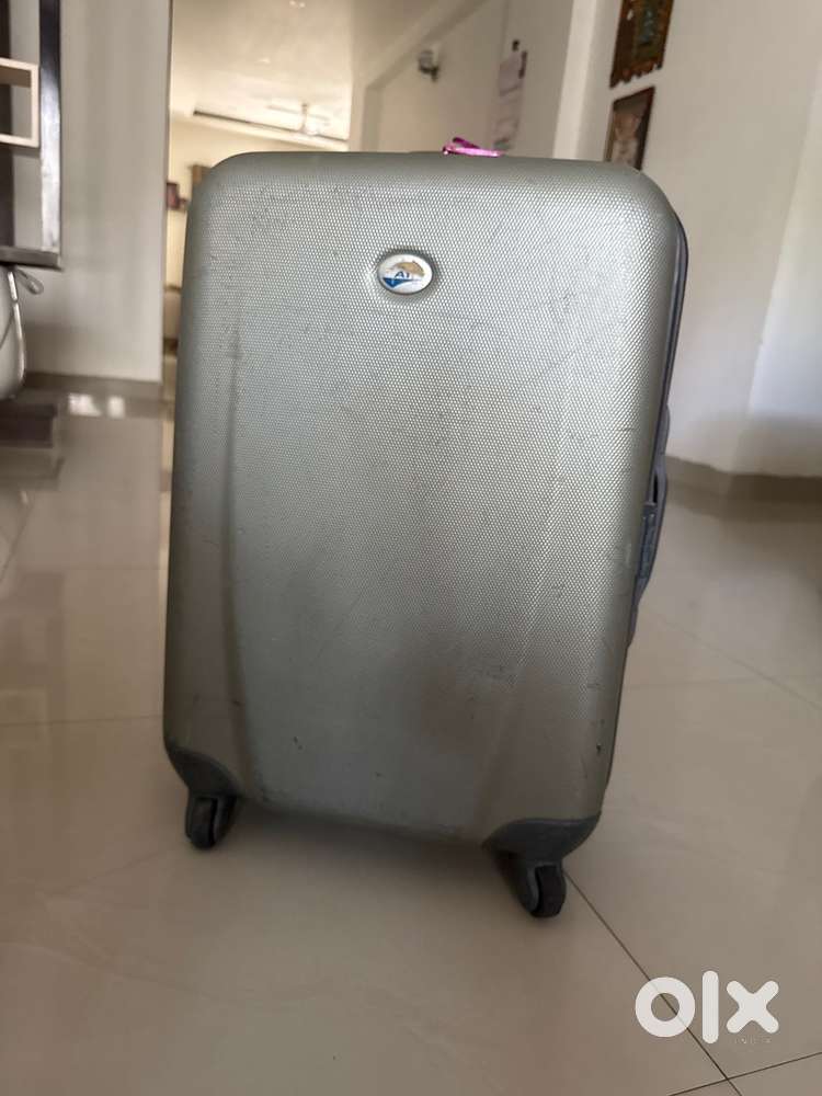 Suitcase and a kids trolley