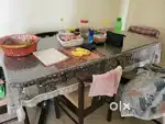 Dining table, double bed, washing machine, dressing table