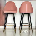 Two,Peach colour bar stools