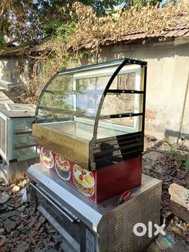 Normal display counter glass sada bakery food farsan