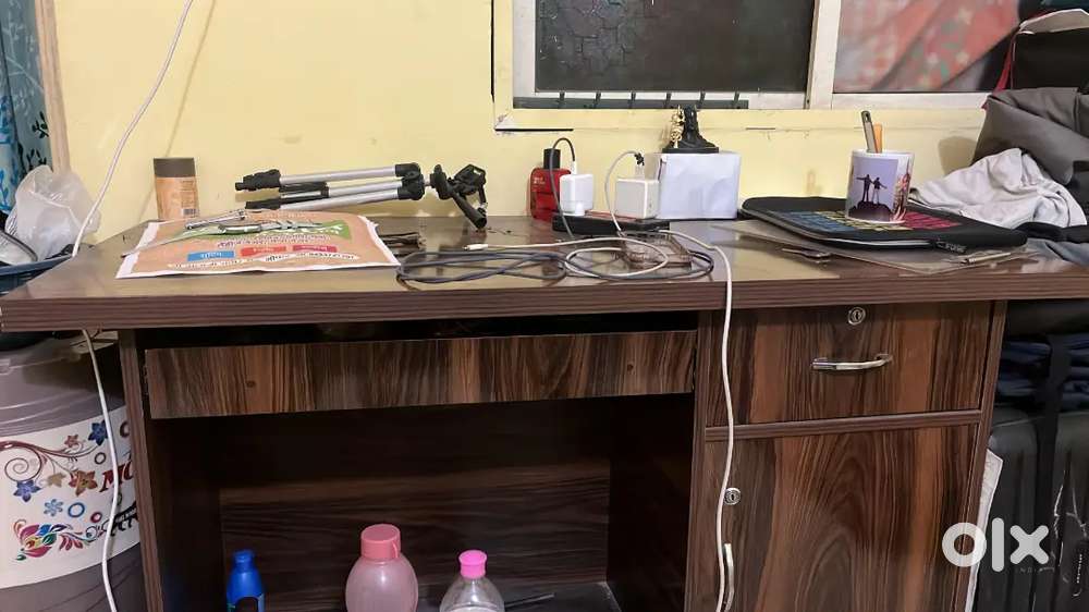 Wooden study and laptop table, with rotating chair.