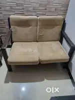 Two seater solid wood sofa