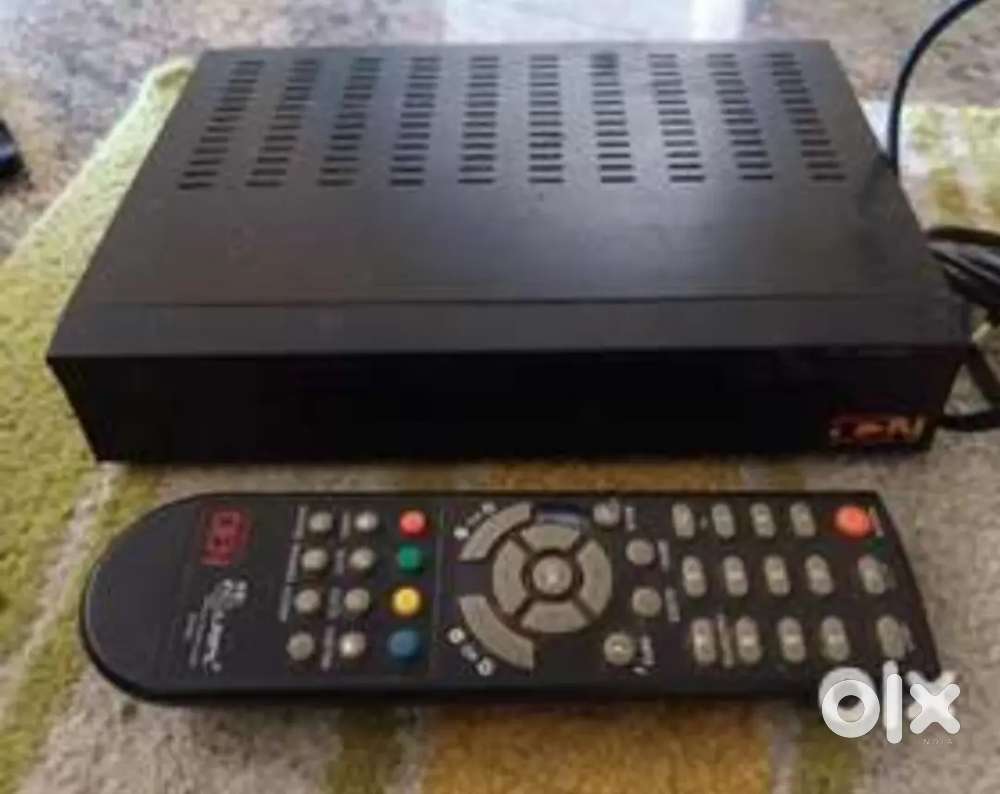 Den Setup box with remote and adapter