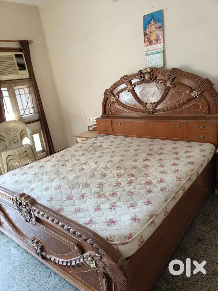 Premium quality wood double bed with side drawers