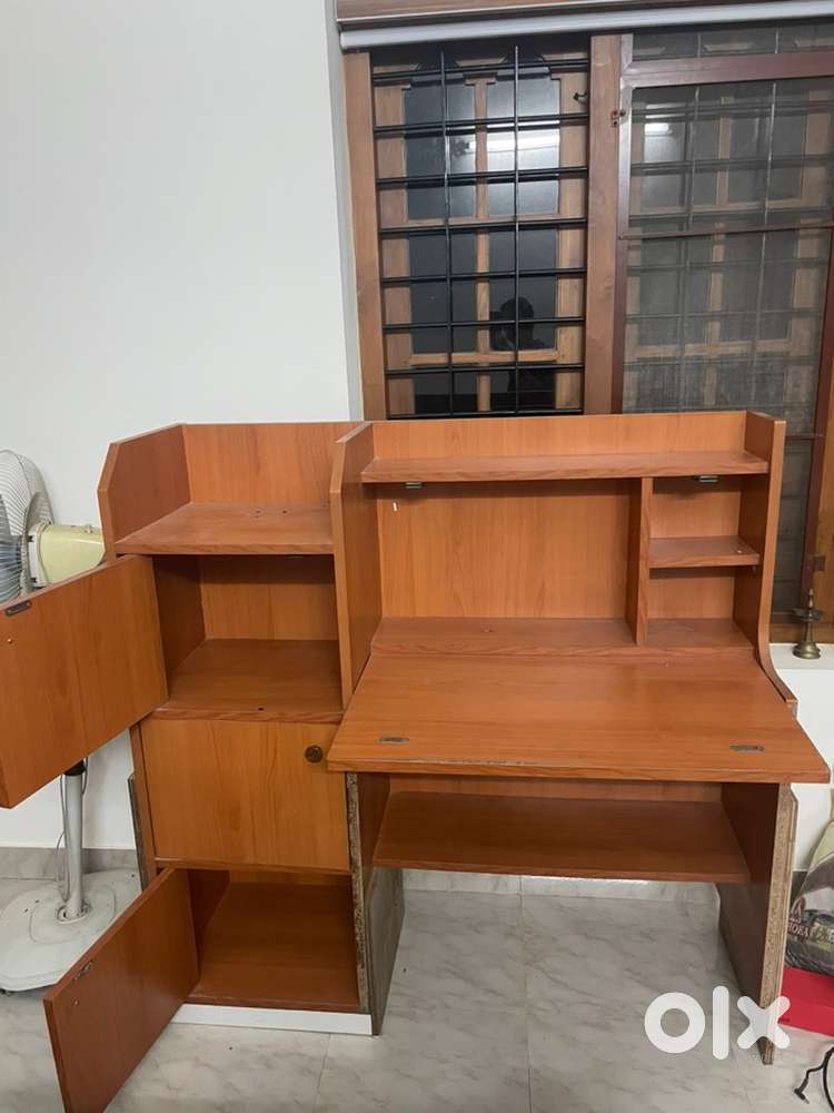 Study table with writing area and storage