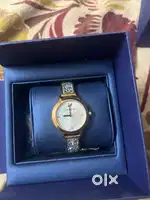SWAROVSKI watch and Travel wallet