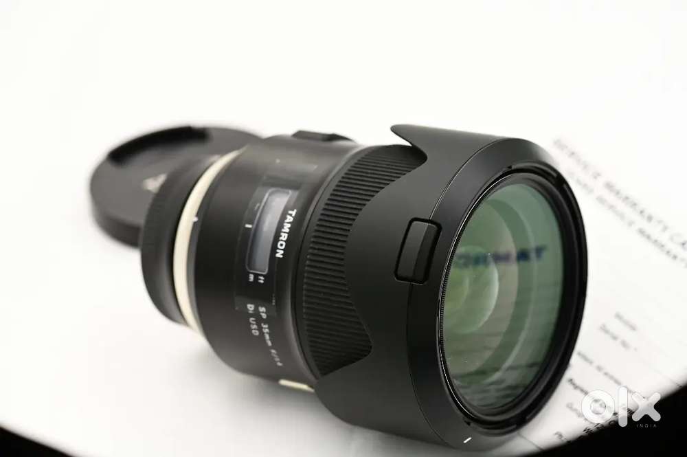 Unused 2 years warranty and new box , Tamron 35mm 1.4 lense for nikon