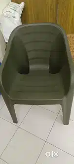 Plastic and wooden chairs and table
