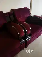 Maroon sofa with black border