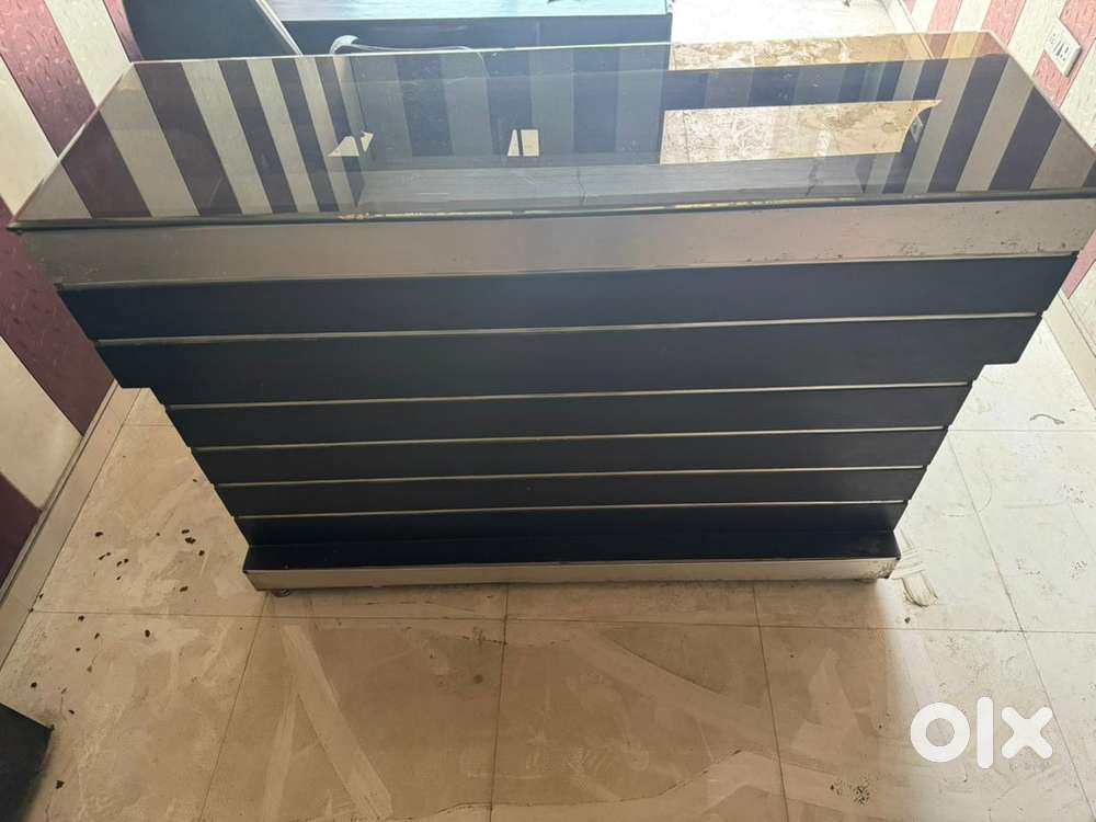 OFFICE TABLE WITH GLASS KING SIZE ONLY 1 YEAR OLD