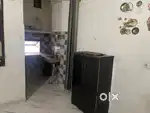 One room set with attached bathroom and kitchen