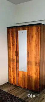 Bed,  Wardrobe, center table, mattress and indian sitting with storage