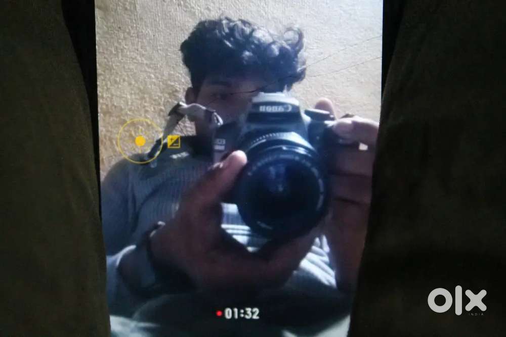 Canon 1100d with lens 18:55