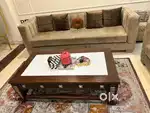 A new wooden center table, ideal for living with Top Marble
