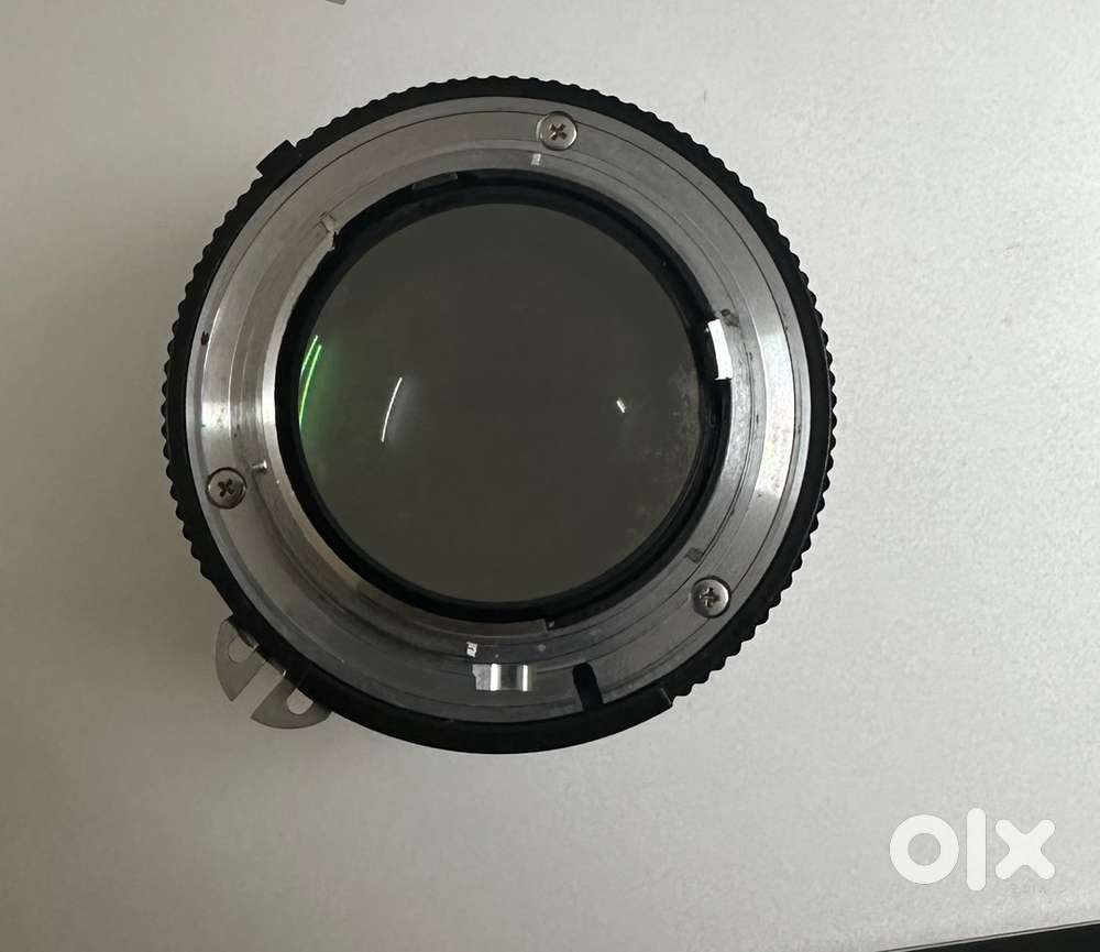 Nikon Nikkor 50mm f/1.2 Lens with accessories