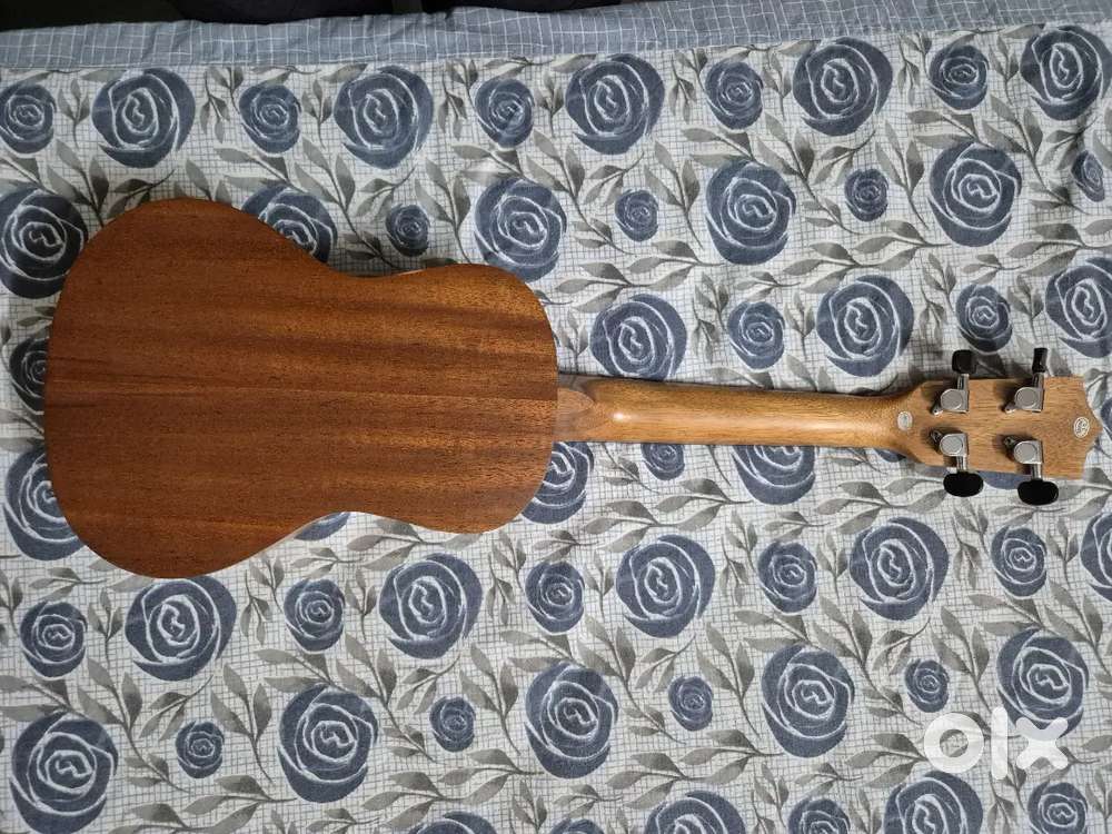 Ukulele in great condition(with cover) and a electronic weighing scale