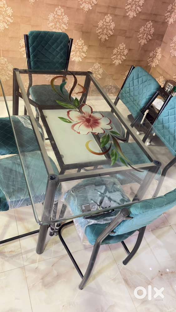 Six seater glass dining table