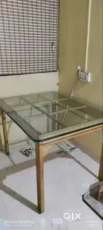Glass top dining table