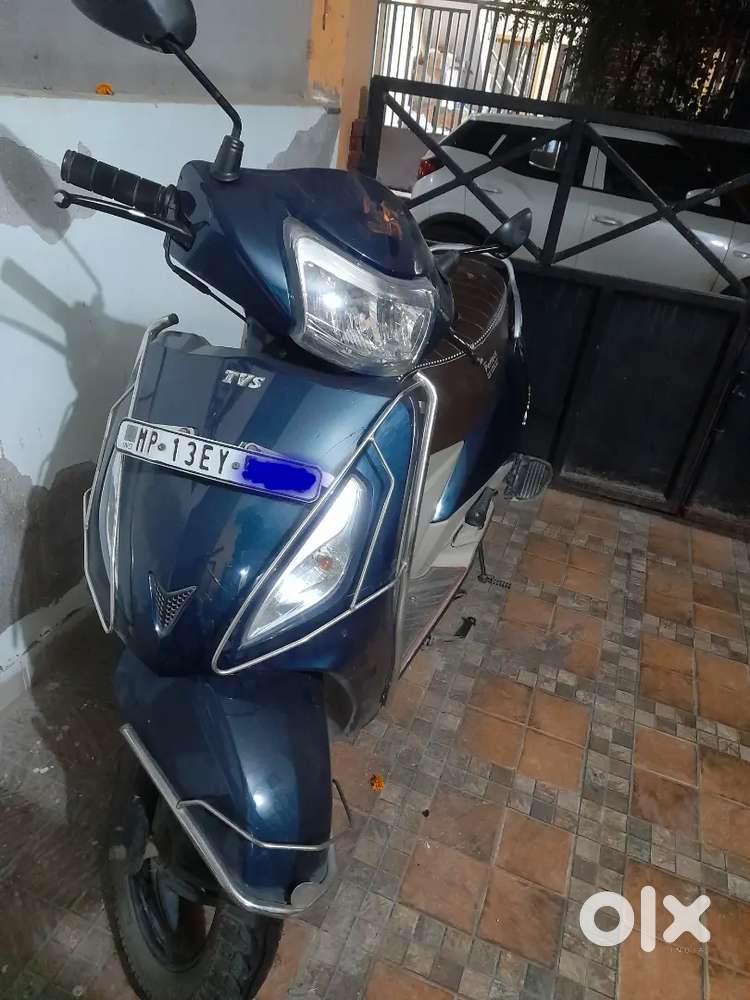 Tvs jupiter zxi with digital meter in showroom condition