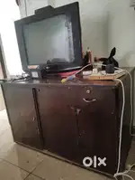 Flat TV with table