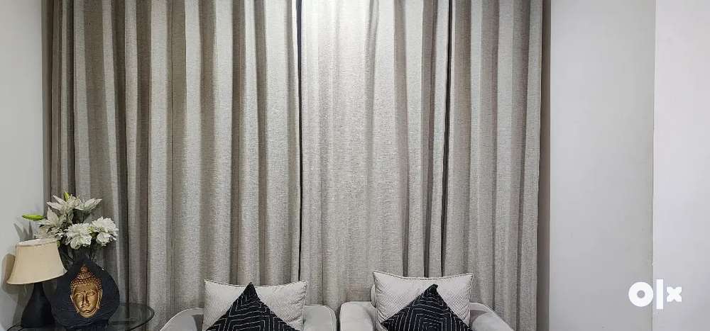 Grey curtains with white sheer