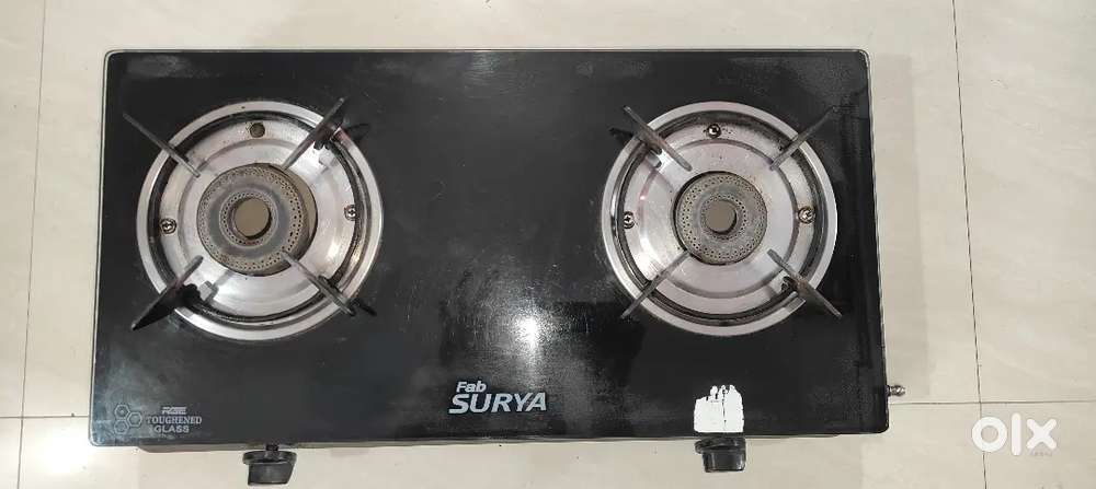 Neatly used Fab Surya glass stove with 2 burners
