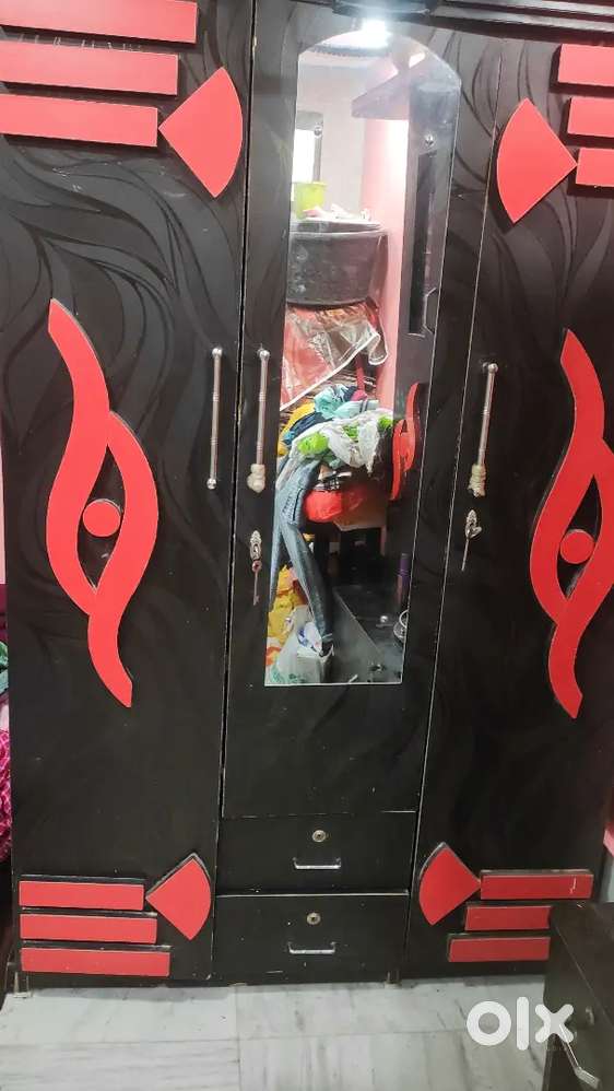 3 - door wooden wardrobe and a dressing table