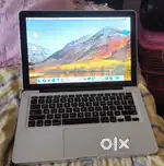 MacBook laptop with charger