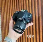 Canon 1200D in mint condition with bag and charger.