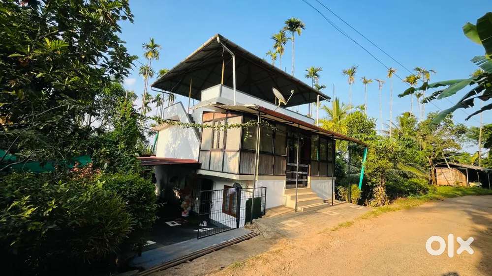 Prime 0.5 Acre Plot with 2-Storey House (Near Padinjarethara, Wayanad)