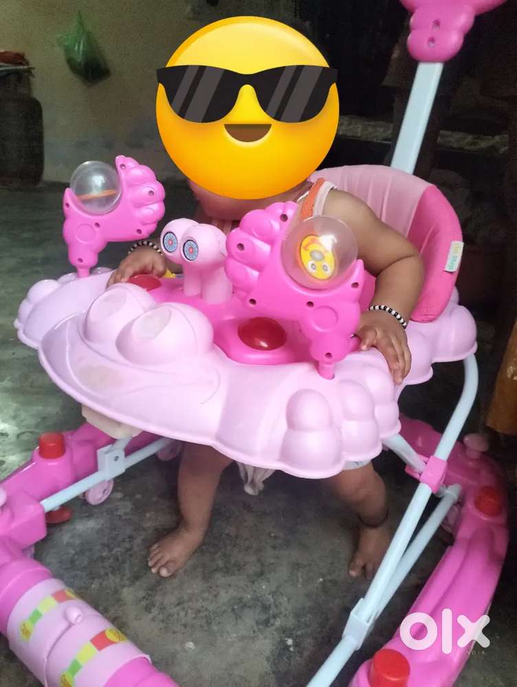 8 wheeler baby walker with music  immediately sale urgent