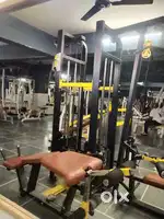 Multi station gym machine