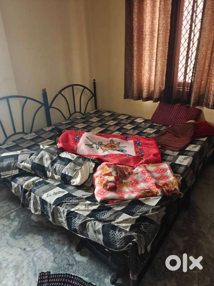 Two Strong Metal Single Beds with Mattresses (3ft × 6ft)