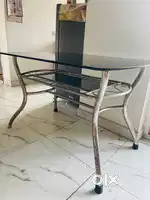 Dining table with glass top including 3 chairs