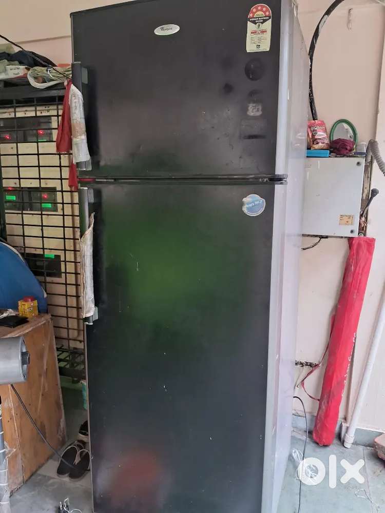 The colour of the fridge is grey from side and black from front