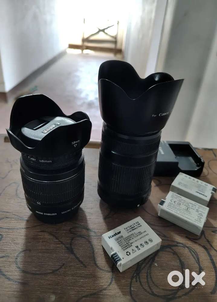 Canon lens and batteries with charger Emergency slide negotiable
