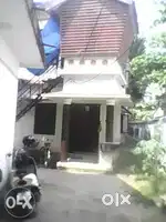 Land with independant house and shop