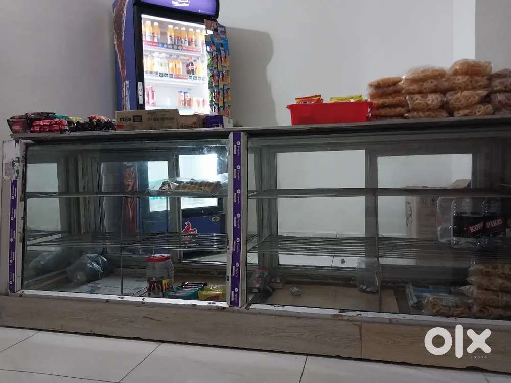 Glass and aluminum door sweet counter nd wodden counter