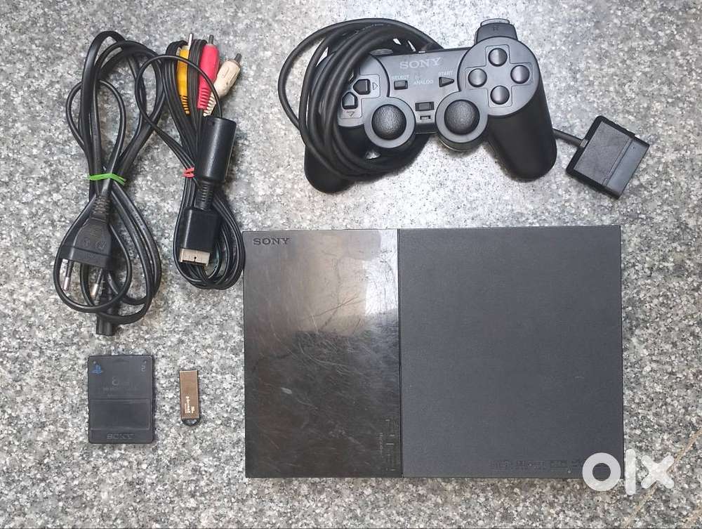 Playstation 2 Slim 32 GB (PS2 9000 Model) with controller and games