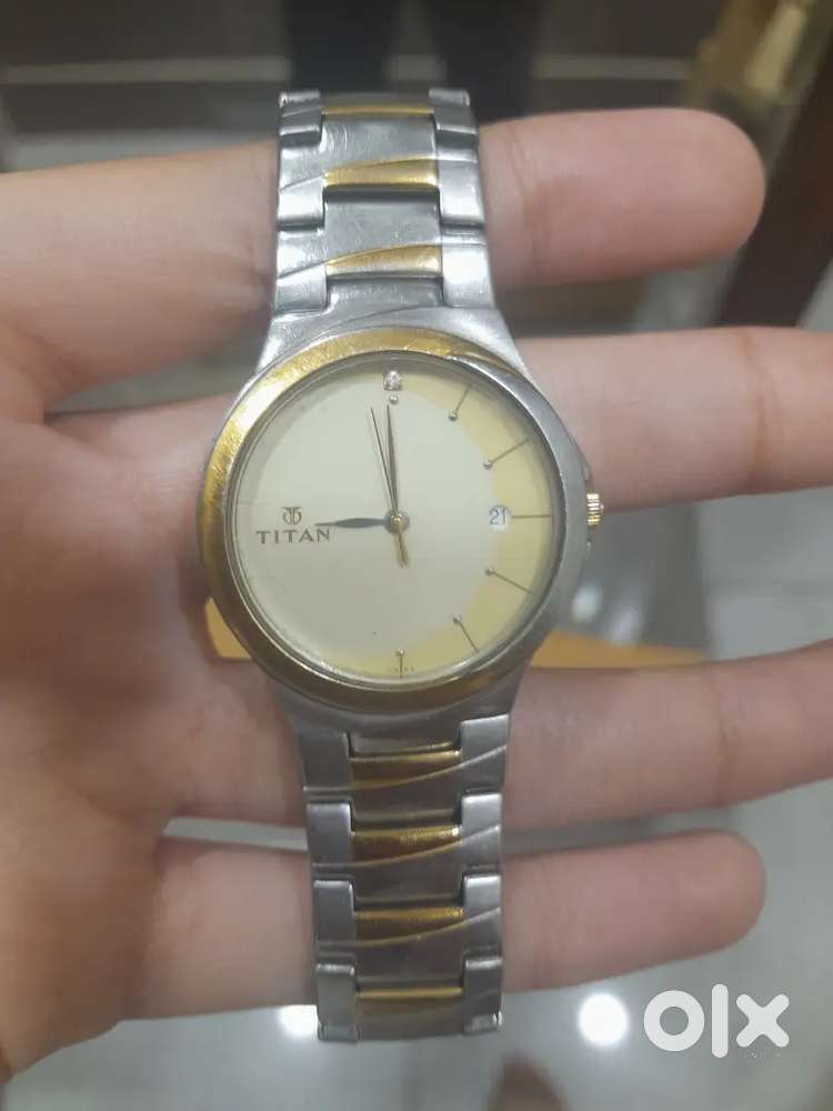 Titan Quartz Analog Champagne Dial Watch
